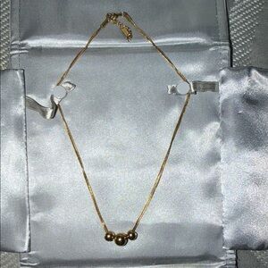 Elegant Gold Necklace with Bead Accents